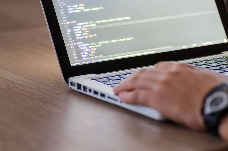 software developer coding laptop