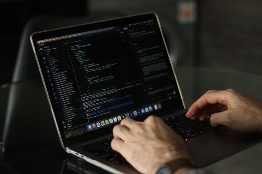 software developer coding laptop