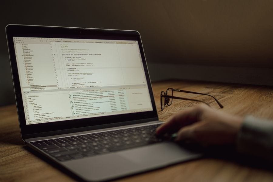 software developer coding laptop
