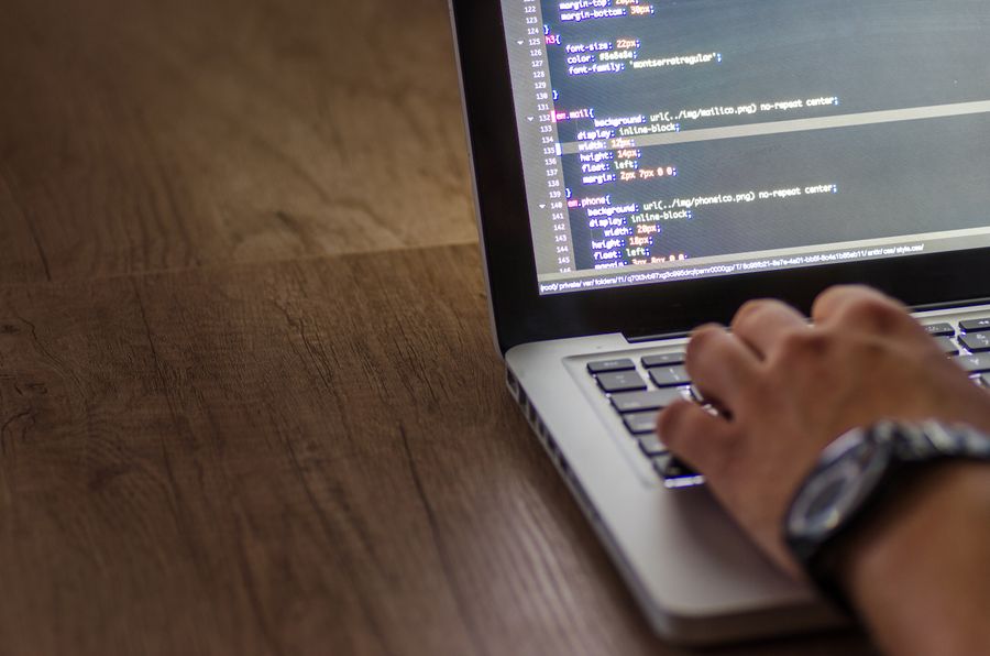 software developer coding laptop