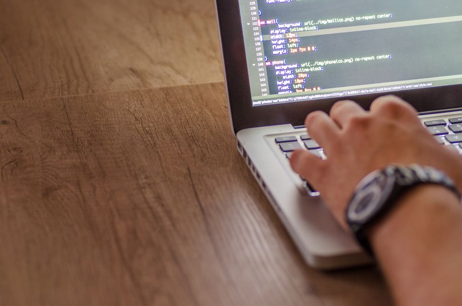 software developer coding laptop