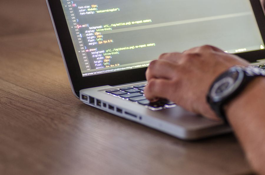 software developer coding laptop