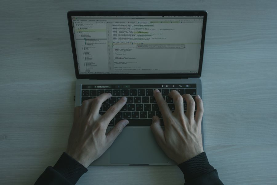 coding on laptop