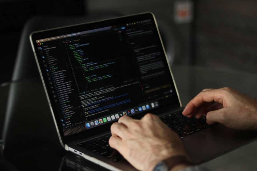 software developer coding laptop